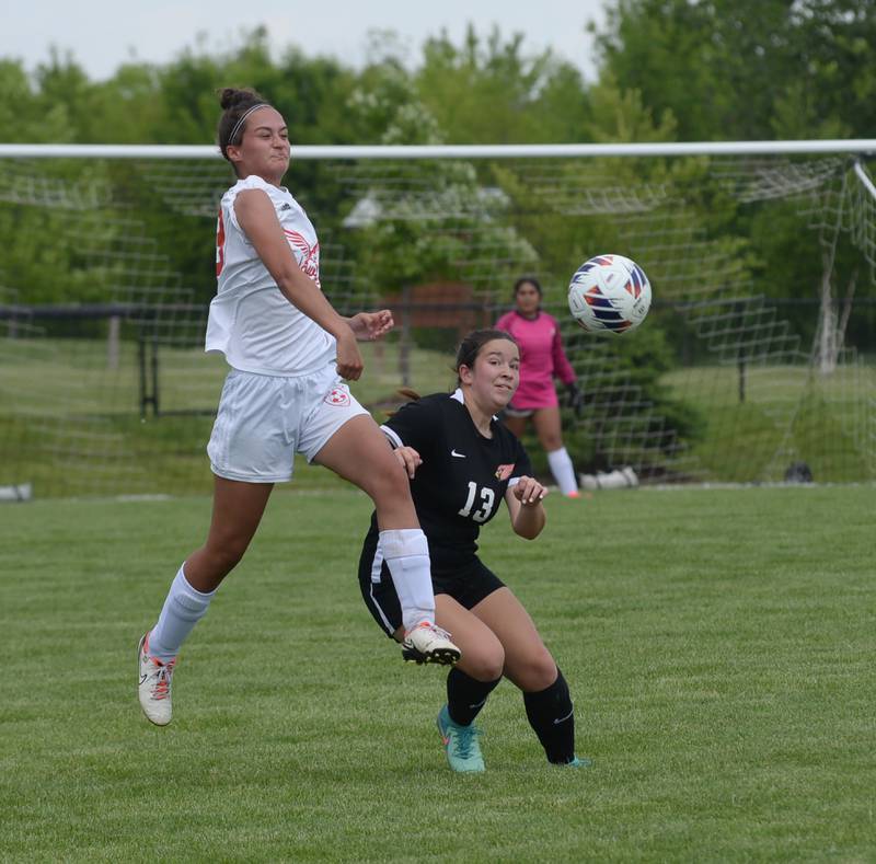 Oregon's Sarah Eckardt (left) clears the ball away from Stillman Valley's Grace Costello at the 1A Indian Creek Sectional on Saturday, May 18, 2024.