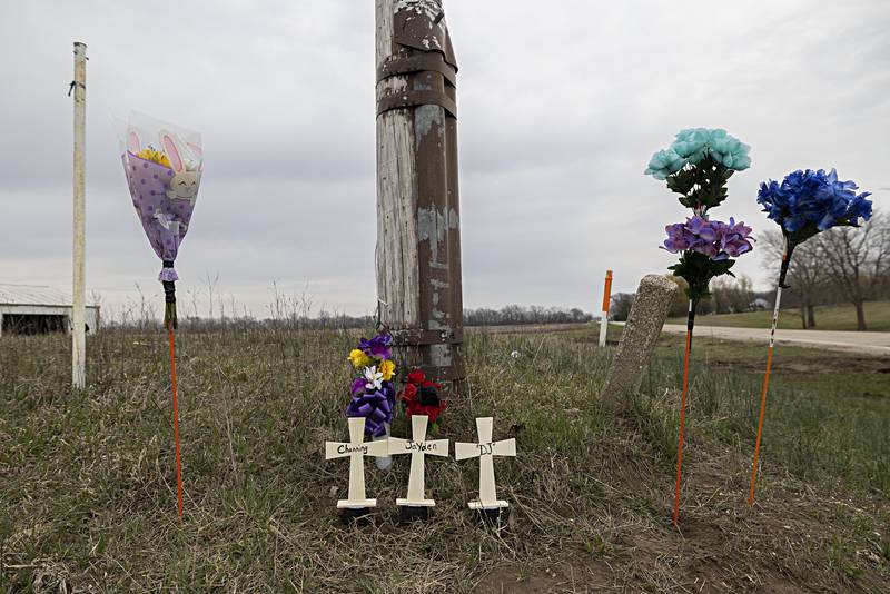 A roadside memorial is seen Friday, March 29, 2024, at the site where three Prophetstown-Lyndon-Tampico High School/Middle School students were killed in a crash at the corner of Luther and Hahnaman roads.
