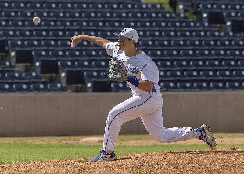 Newman’s Evan Bushman fires a pitch against Chicago Hope Monday, May 27, 2024 during the Class 2A super-sectional in Rockford.