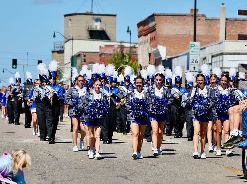 Princeton cheerleaders walk down Main Street during the Homestead Festival on Saturday, Sept. 7,, 2024 in Princeton.