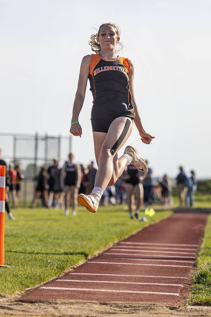 Milledgeville’s Trixie Carroll glides through her jump in the long jump Wednesday, May 10, 2023 at the class 1A Erie girls track sectional.