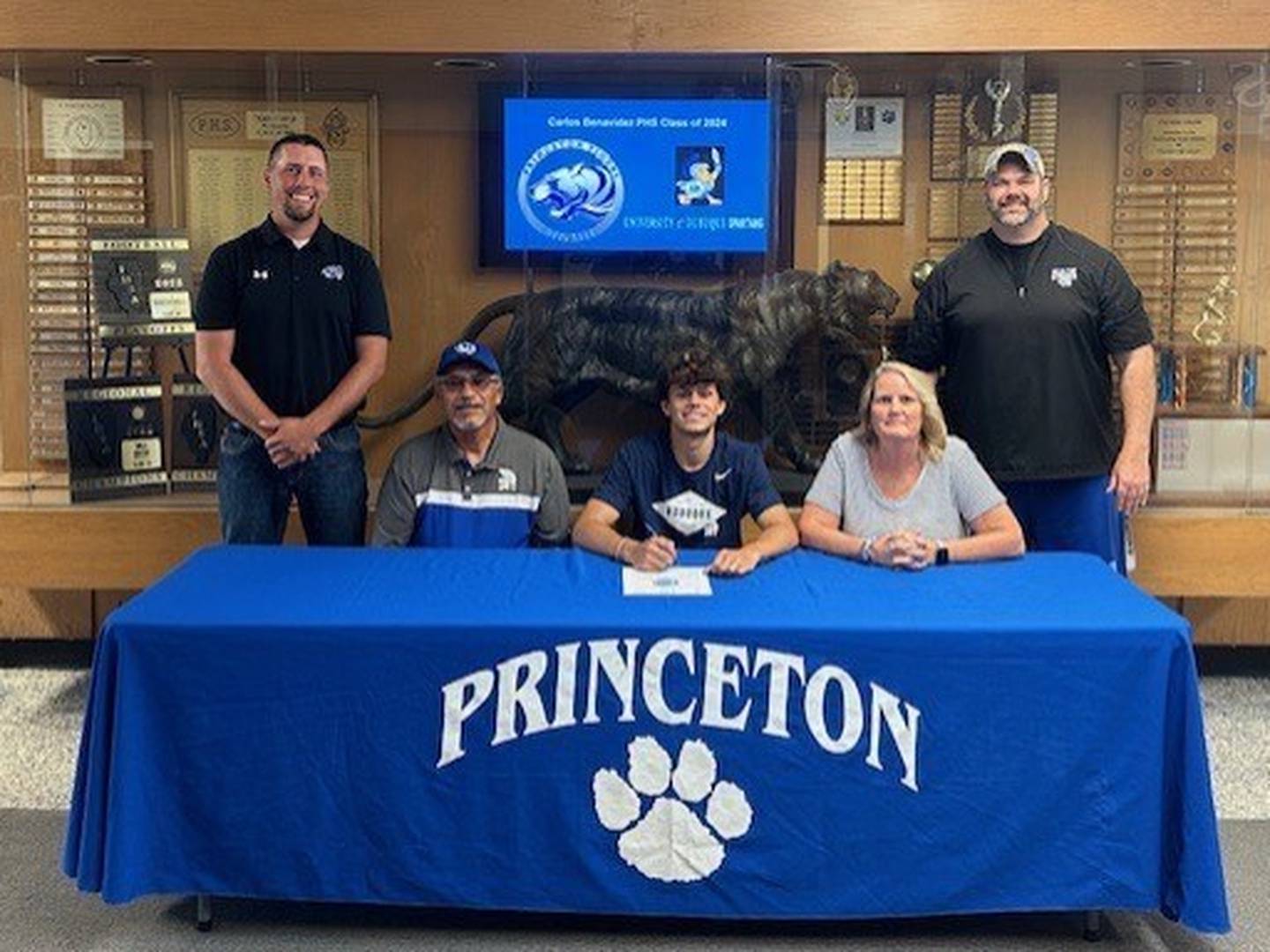 Recent Princeton graduate Carlos Benavidez recently signed to play soccer for the University of Dubuque. He was joined at his signing by his parents (front)  Rod and Sondra Benavidez; and (back row) PHS coaches Nick Lowe and Ryan Pearson.