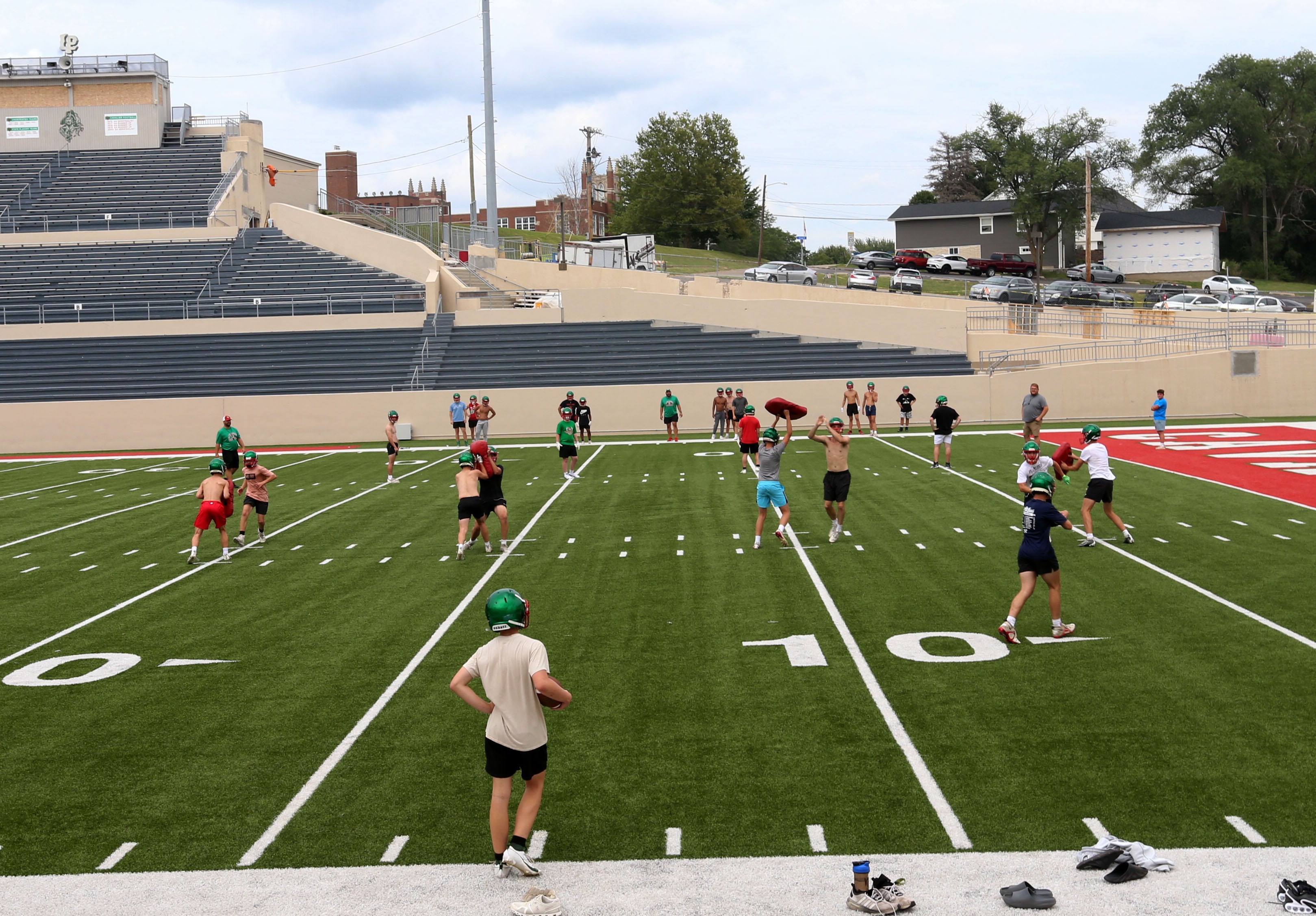 Members of the L-P football run drills during the first day of football practice on Monday, Aug. 12, 2024 at Howard Fellows Stadium.