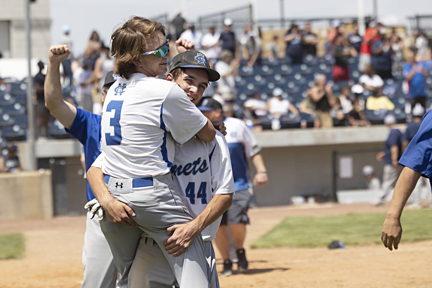 Newman celebrates their 3-2 supersectional baseball game against Chicago Hope Monday, May 29, 2023. Newman will play next week in Peoria for the class 1A state title.