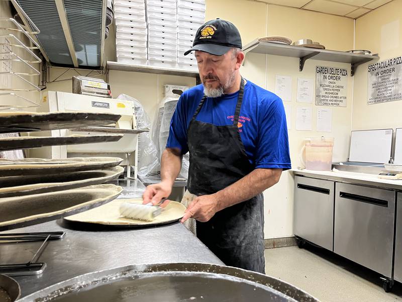 Ernesto Lopez, a chef for Chicago Dough, 1080 E. Lincoln Highway, working on the kitchen on Friday, Sept. 1, 2023. Throughout September restaurant will feature pizzas designed by the New Lenox Police Department, the New Lenox Fire Protection District and Laraway Communications Center.