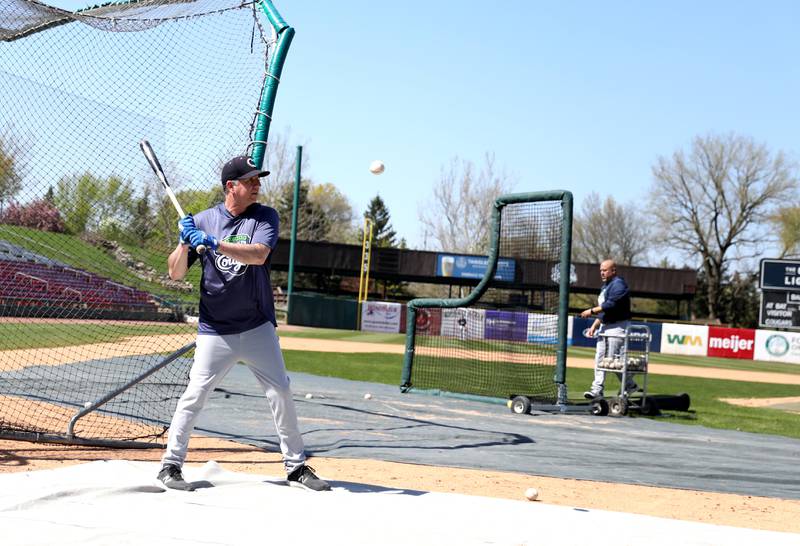 Kane County Cougars Manager George Tsamis hits to infielders during a practice at Northwestern Medicine Field in Geneva on Thursday, May 4, 2023. The Cougars’ season opens May 11.