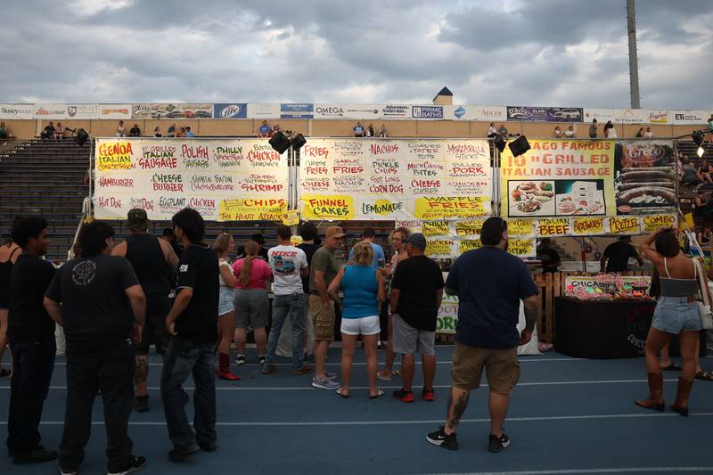 People line up for the tradition carnival food at the Taste of Joliet on Saturday, June 22, 2024 at Joliet Memorial Stadium.