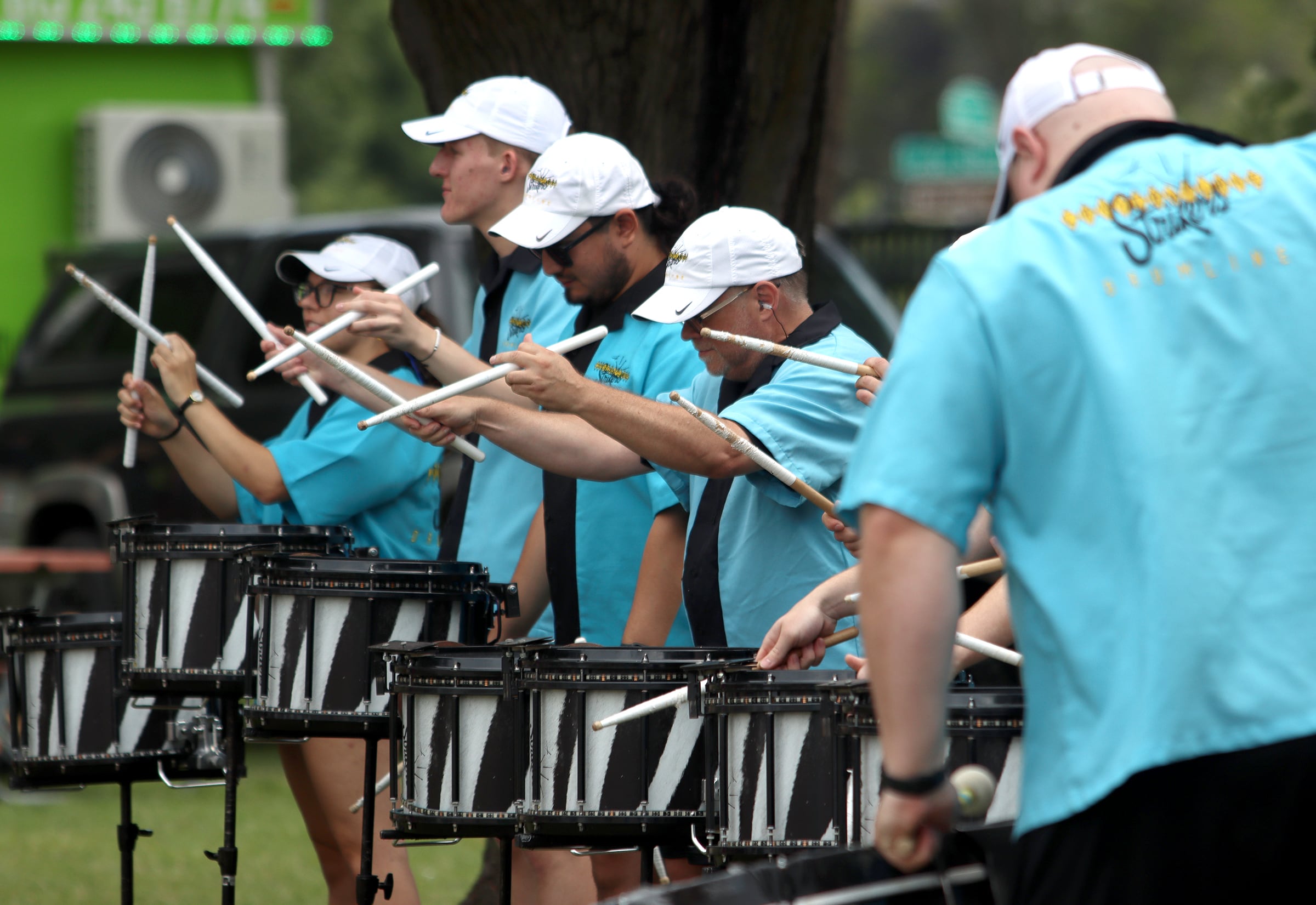 The Crystal Lake Strikers musical group entertains before the Cardboard Regatta on Crystal Lake Saturday.