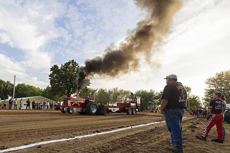 Josh Wachholz starts his run at the Badger State Tractor Pullers event Wednesday, August 9, 2023 at the Carroll County fair.