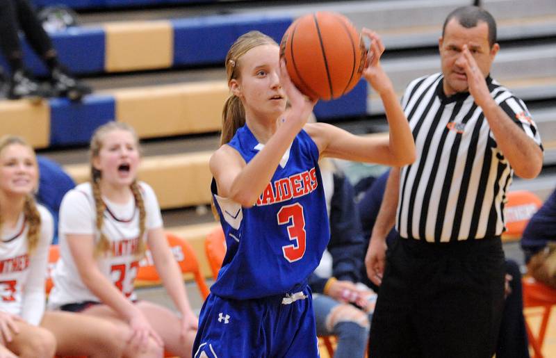 The Oswego bench tries to distract Glenbard South's Jamie Mizwicki's three-point shot during a girls varsity basketball game at Oswego High School on Wednesday, Nov. 16, 2022.