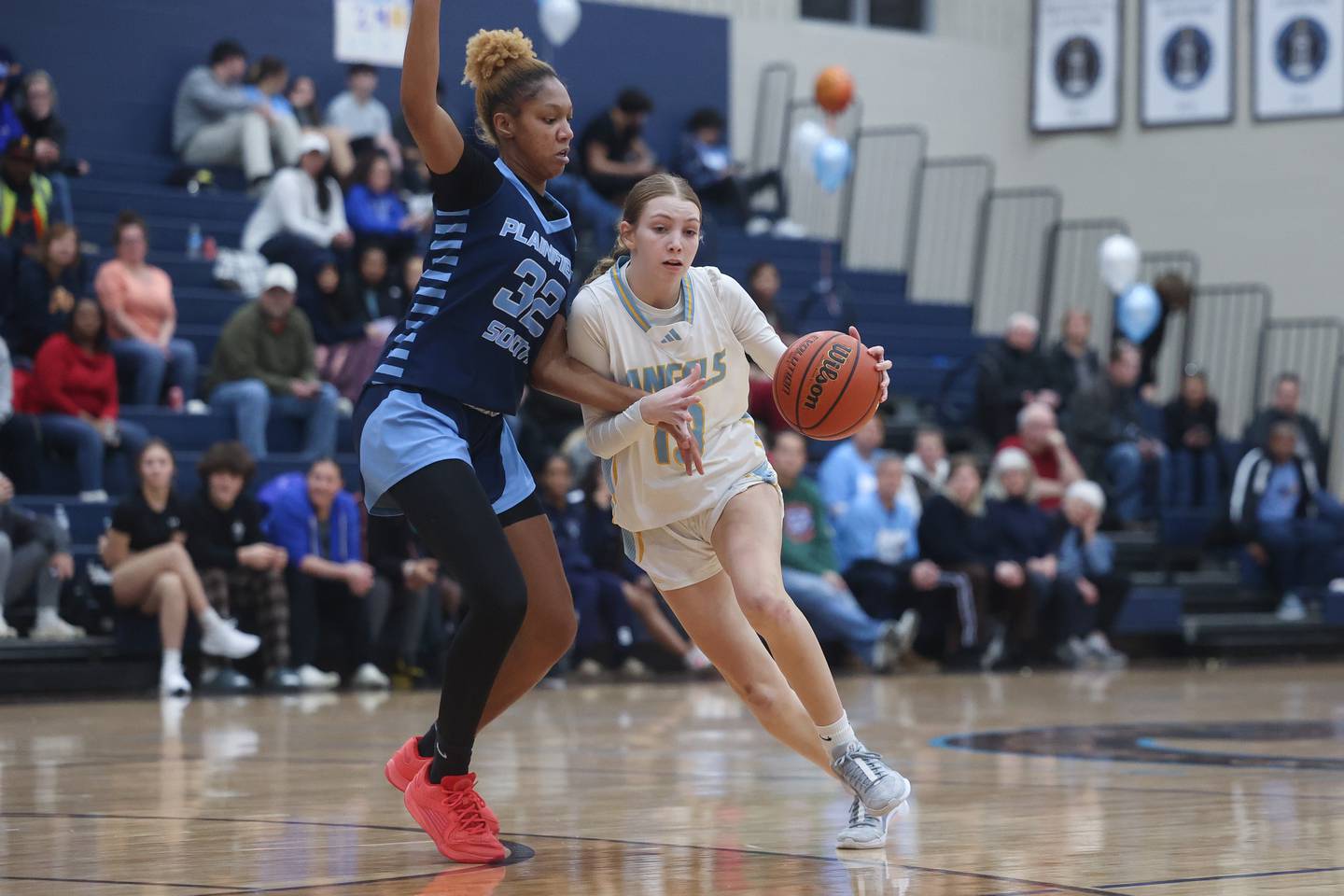 Joliet Catholic’s Abby Dulinsky works the ball against Plainfield South’s Destynia McGruder on Monday, Jan. 29th, 2024 in Joliet.