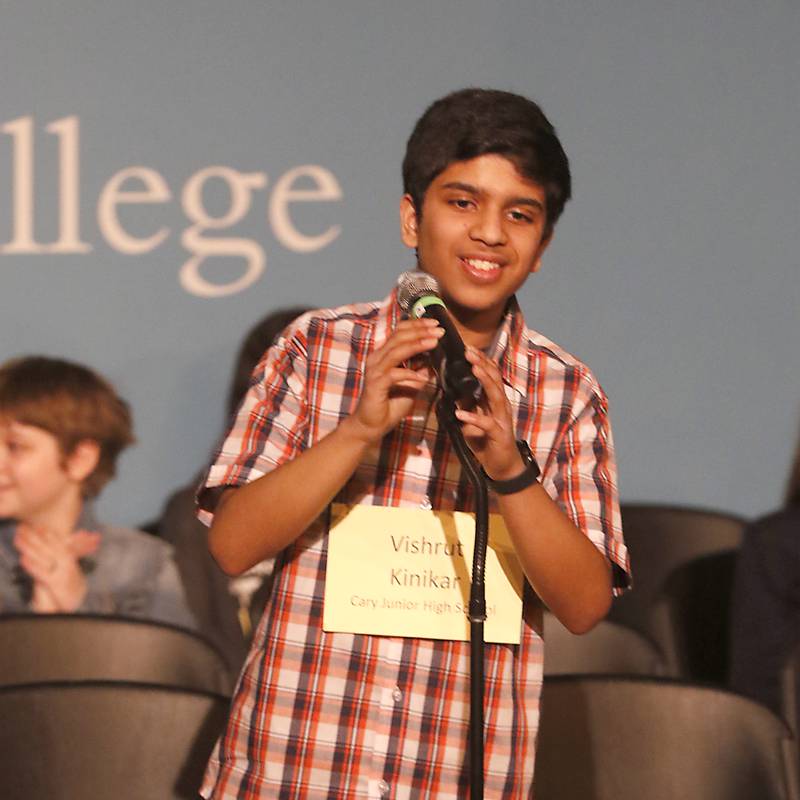 Vishrut Kinikar of Cary Junior High School smiles after spelling “scullery” to win the McHenry County Regional Office of Education's 2023 spelling bee on Wednesday, March 22, 2023, at McHenry County College's Luecht Auditorium in Crystal Lake.