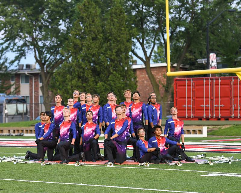 Members of the Blue Stars from La Crosse, Wisconsin, get set to perform their routine at the Drum Corps International Midwest Classic on Saturday, July 13, 2024, at Northern Illinois University Huskie Stadium in DeKalb.