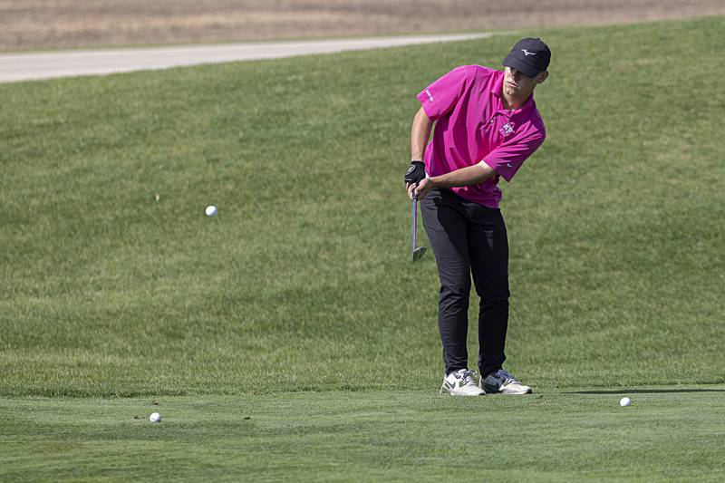 Rock Falls’ Conner Porter chips on #1 Wednesday, Sept. 27, 2023 during the class 2A golf regionals at Deer Valley Country Club.