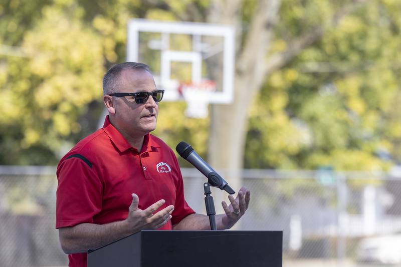 Dixon City Manager Danny Langloss speaks during the dedication of the Larry and Louise Reed Basketball Courts Tuesday, Sept. 17, 2024, at Vaile Park.