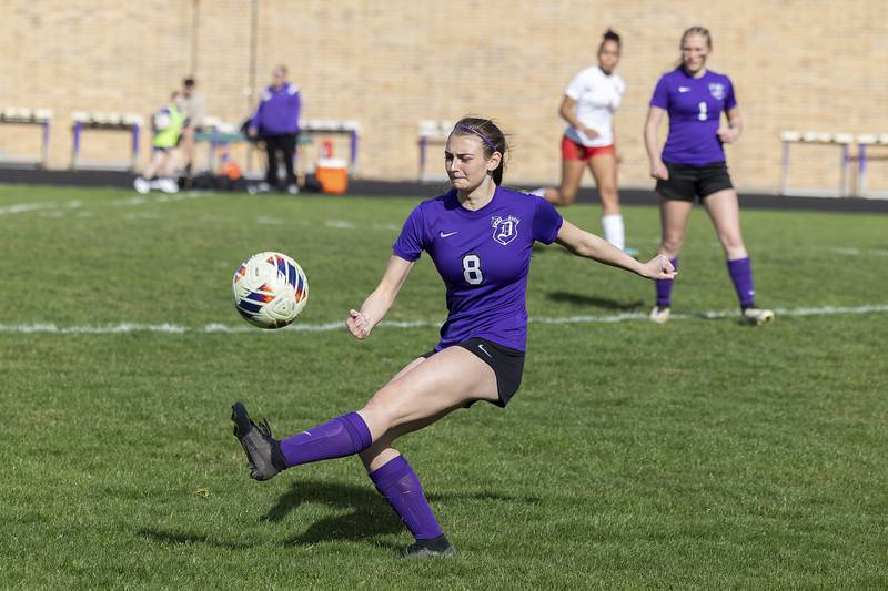 Dixon’s CJ Frey boots the ball upfield against Rock Island Friday, April 12, 2024 in Dixon.