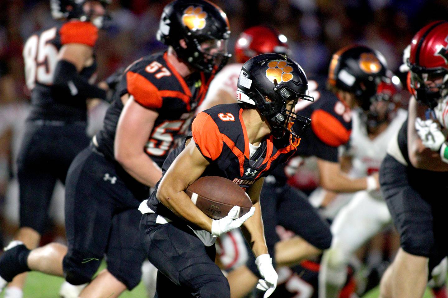 Crystal Lake Central’s Kiran Pokharel runs the ball against Huntley in varsity football on Friday, Aug. 30, 2024, at Metcalf Field on the campus of Crystal Lake Central High School in Crystal Lake.