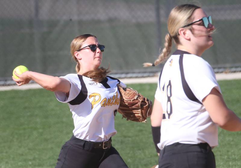 Putnam County's Gabby Doyle throws to first base to force out a Seneca runner on Thursday April 13, 2023 in Seneca.