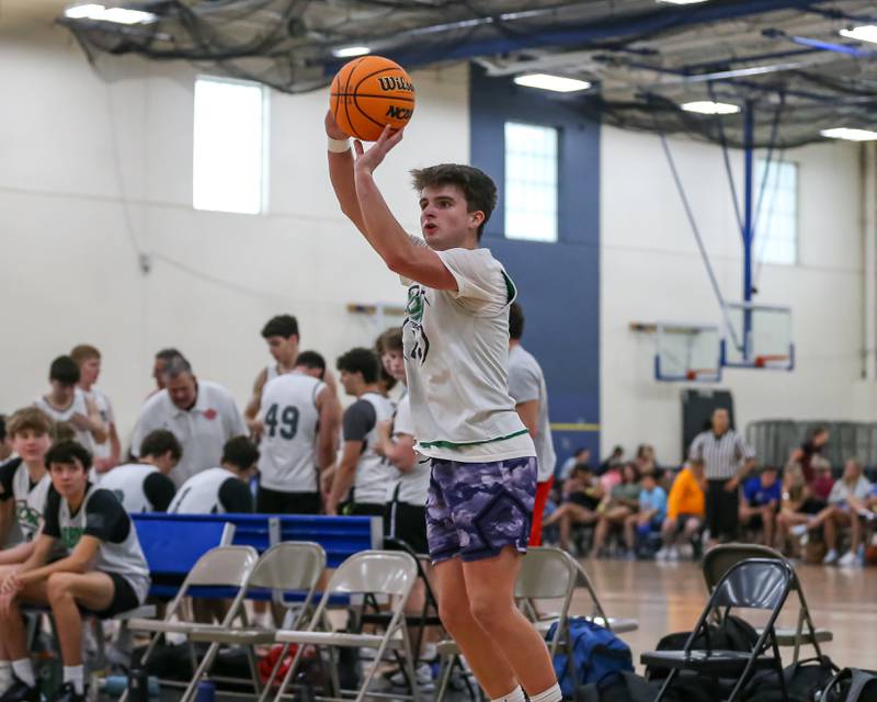 Benet's Colin Stack puts up a shot at the Riverside-Brookfield Summer Shootout basketball tournament. June 22, 2024.