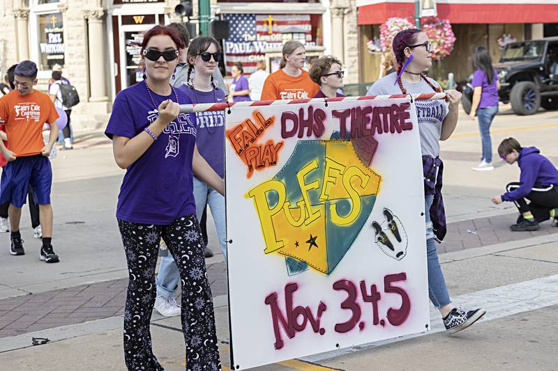 The theater department advertises their upcoming play Friday, Sept. 29, 2023 while marching through the homecoming parade in Dixon.