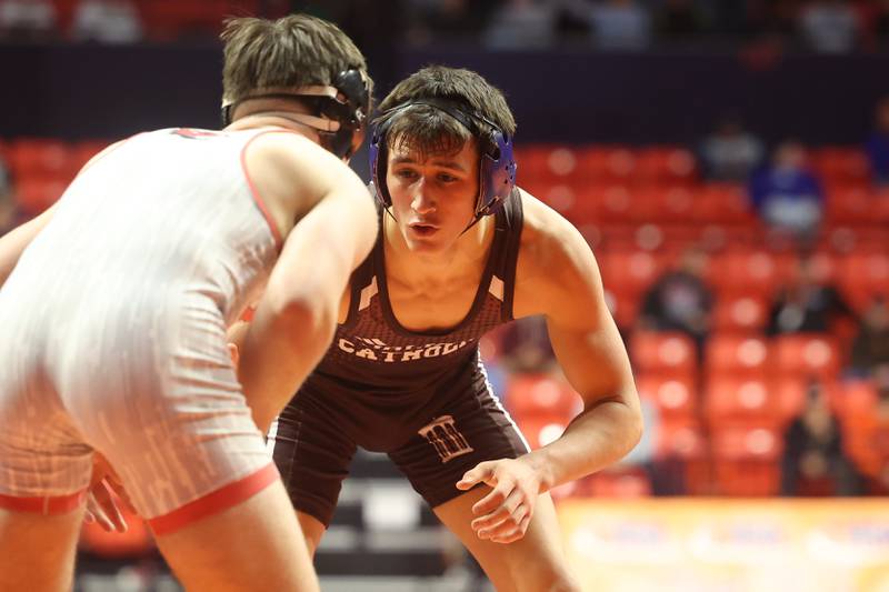 Joliet Catholic’s Luke Hamiti takes on Yorkville’s Ryder Janeczko in the 157-pound Class 3A state 5th place match on Saturday, Feb. 17th, 2024 in Champaign.