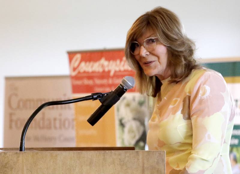 Award recipient Terry Greeno speaks during the Northwest Herald's Women of Distinction award luncheon Wednesday June 5, 2024, at Boulder Ridge Country Club, in Lake in the Hills. The luncheon recognized 11 women in the community as Women of Distinction.