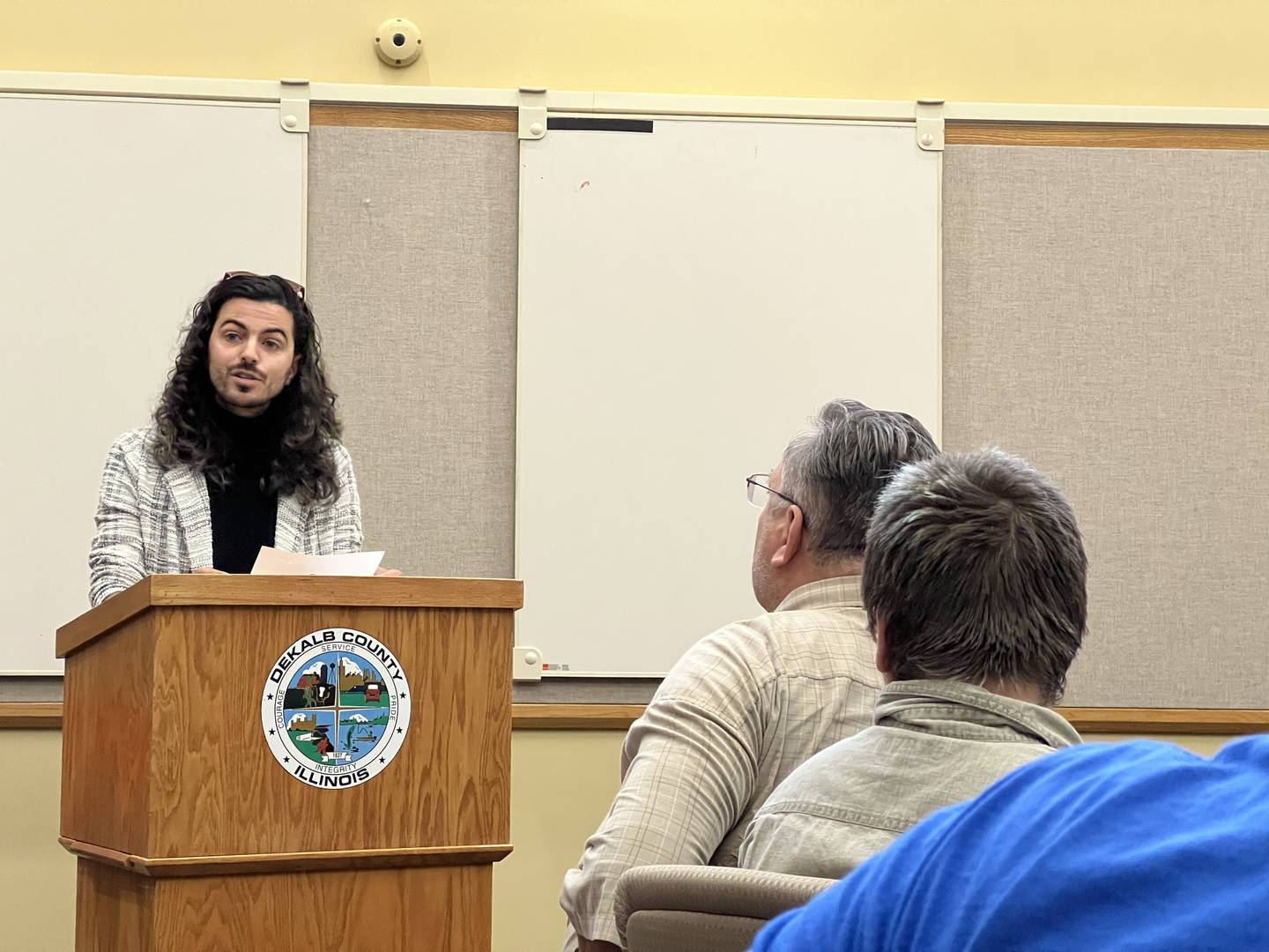 Frankie DiCiaccio, a leader of DeKalb Migrant Aid – a local group formed in January 2024 as a result of a DeKalb City Council decision to enable city officials to fine bus drivers who drop off migrants without warning – spoke against a proposed resolution that would have declared DeKalb County a non-sanctuary for asylum seekers during a DeKalb County Board Law and Justice Committee meeting on May 20, 2024.