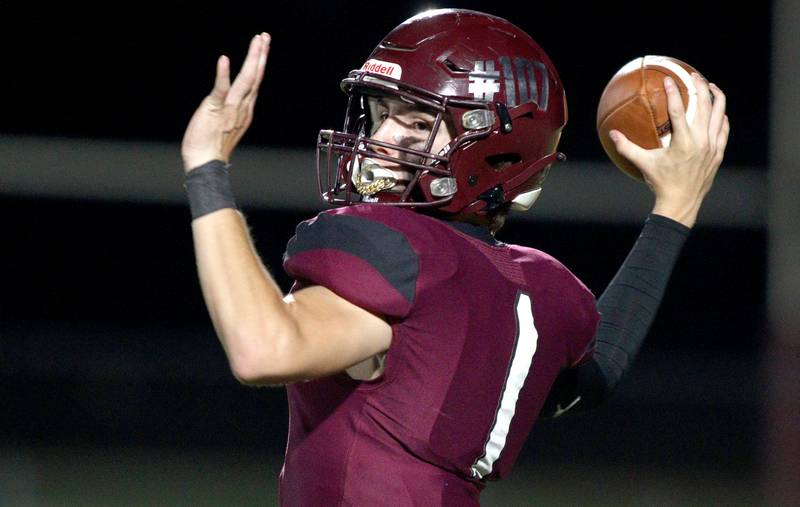 Marengo’s David Lopez passes against Richmond-Burton in varsity football at Rod Poppe Field in Marengo Thursday night.