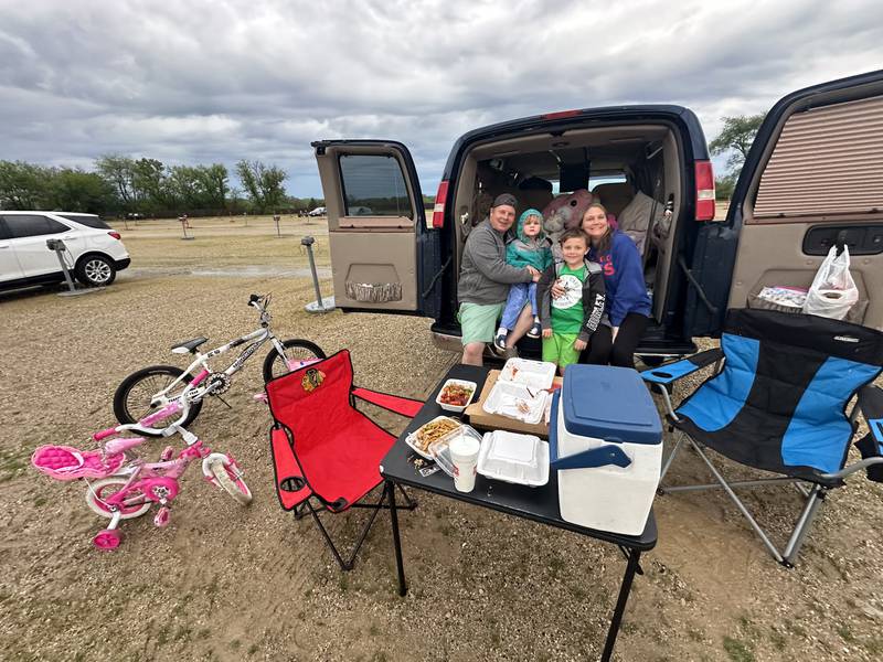 McHenry residents (from left) Karl, Danika, Donovan and Rachel Plancon enjoyed an evening at the McHenry Outdoor Theater this spring. The theater will be the location of a diaper drive Sunday, May 19. Donors will be invited to stay for a special showing of "The Boss Baby" at no charge.
