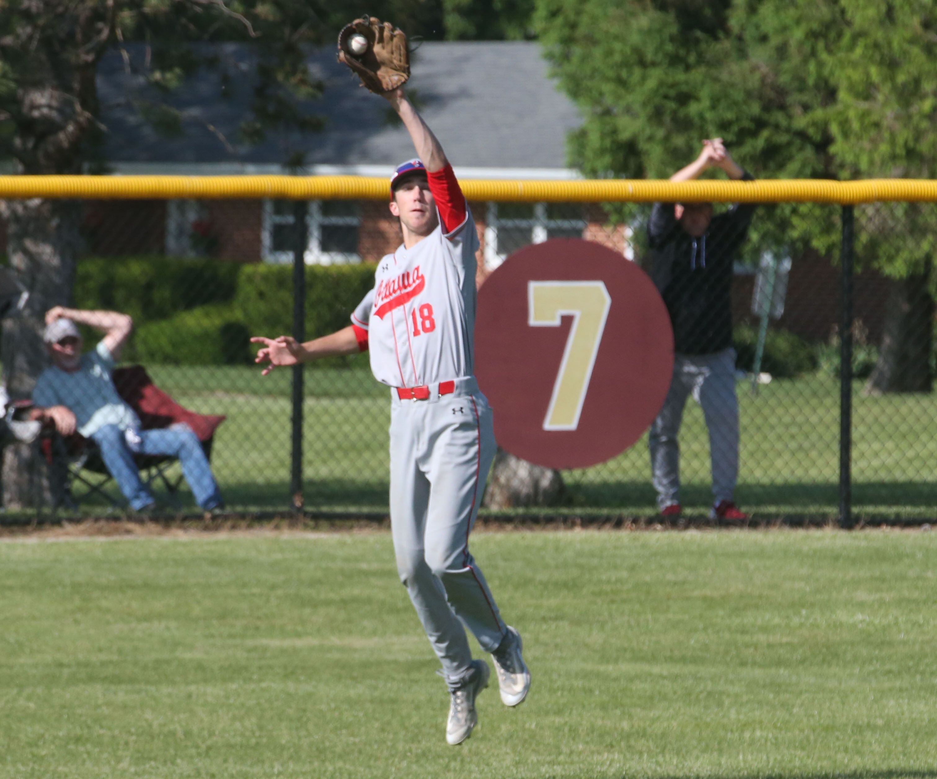 Ottawa's Jack Henson fields a groundball as it bounces above his head against Rock Island during the Class 3A regional semifinal Thursday, May 25, 2023, at Morris High School.