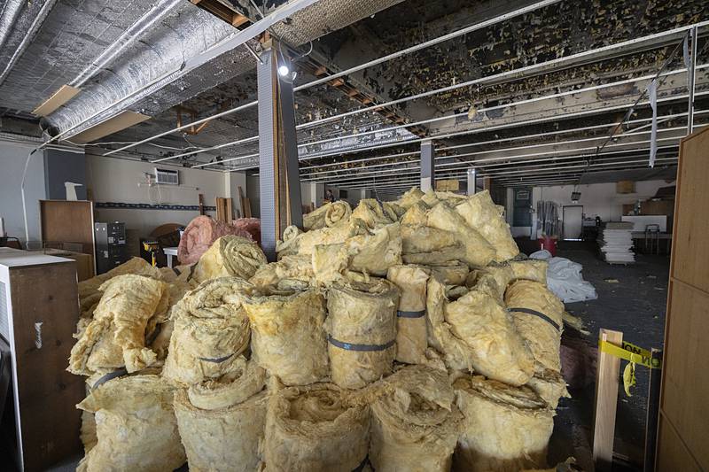 After tearing down the drop ceiling, the insulation was removed and bundled for use from the old building Wednesday, July 3, 2024.