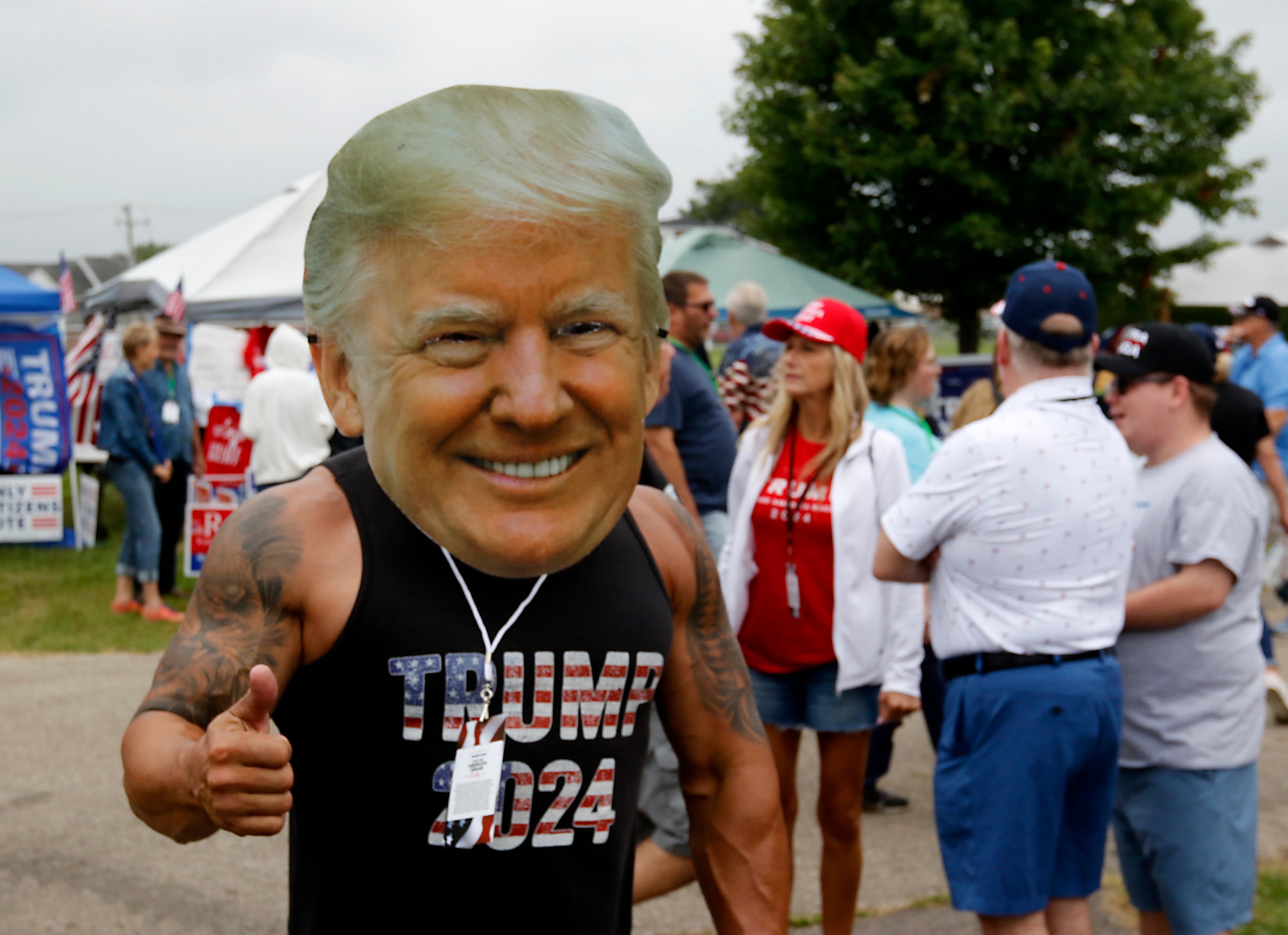 Mike Volpe of St. Charles, gives a thumbs up during the Trump Now-Save the American Dream Rally at the McHenry County Fairgrounds on Sunday Aug. 18, 2024, in Woodstock.