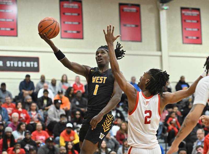 Joliet West's Justus Mcnair drives to the basket for a layup during the Class 4A sectional semifinal against Homewood Flossmoor at Rich Township on Tuesday, Feb. 27, 2024, at Richton Park. (Dean Reid for Shaw Local News Network)