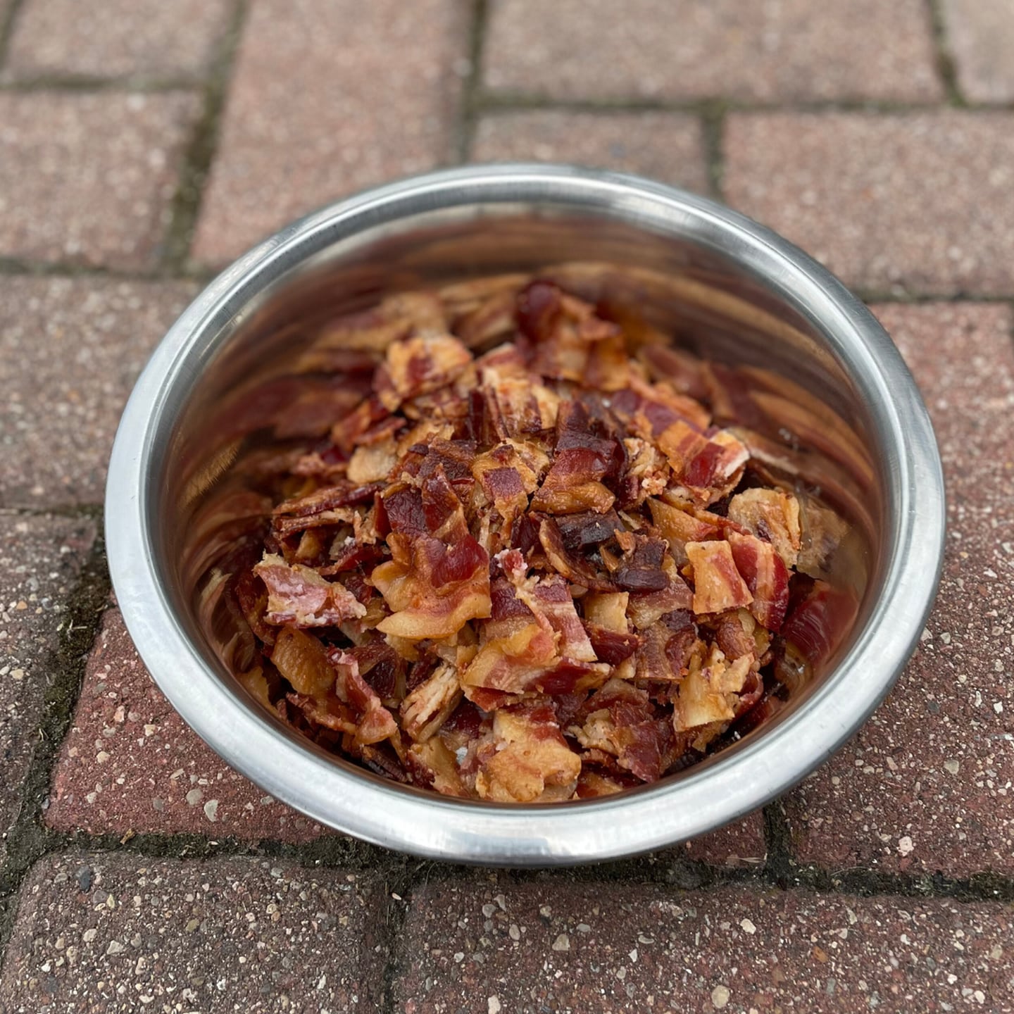 Craft’d has three pooch-pleasing menu items: Barking Bacon (two pieces of bacon and three bones, pictured above), Bow-Wow Burger (grilled burger patty with brown rice and six bones) and Bird Dog Chicken (grilled chicken breast with brown rice and six bones).