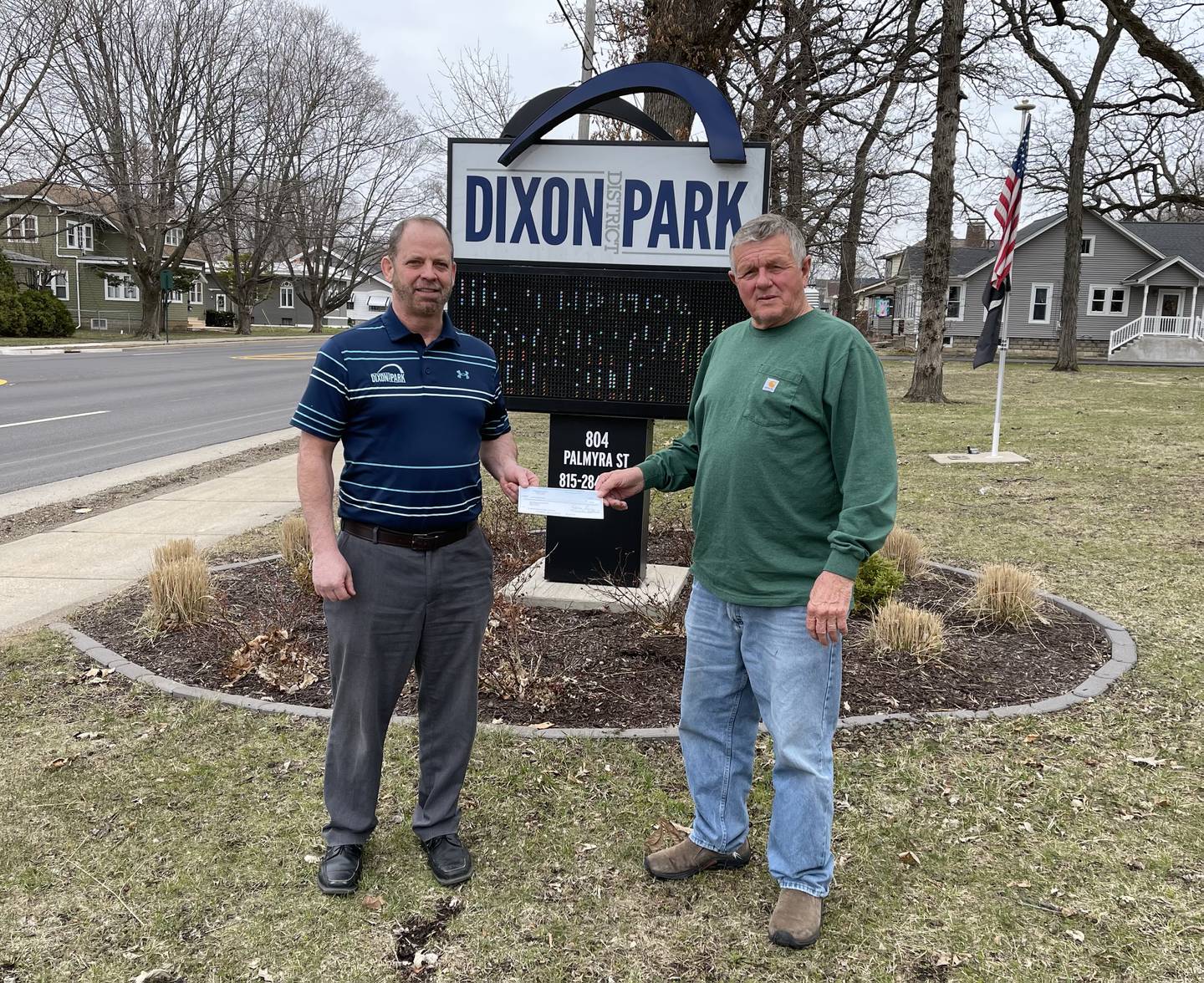 Dixon Park District Executive Director Duane Long presenting Doug Near a donation to Dixon American Legion Post 12 in Doug's name. Photo provided by Dixon Park District.