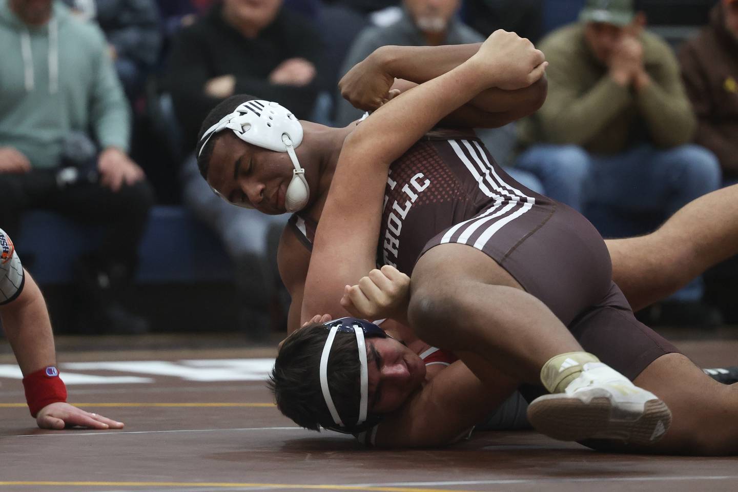 Joliet Catholic’s Dillan Johnson pins Marian Central’s Kaleb Eckman in 26 seconds in the tri-meet at Joliet Catholic on Thursday, Jan. 18th, 2024 in Joliet.