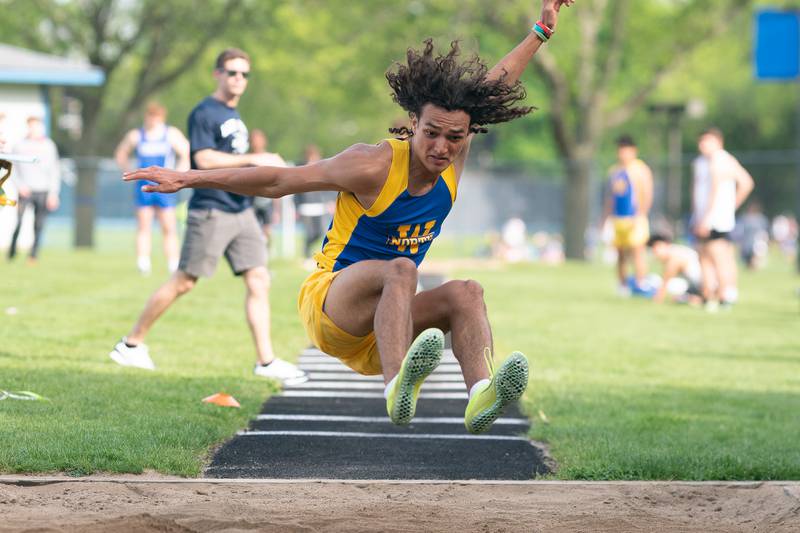 Wheaton North’s Stephen DeMoss competes in the long jump during a DuKane Conference boys track and field meet at Geneva High School on Thursday, May 11, 2023.