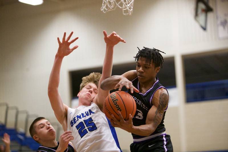 Geneva's Hudson Kirby battles for the rebound with Hampshire's Adrian Ugochukwu  at Geneva Day of Hoops on Monday, Jan. 15th in Geneva.