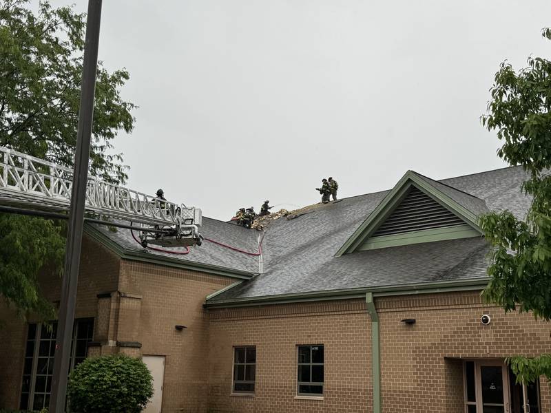 Firefighters respond to a roof fire on Sunday, May 26 at Timber Ridge Middle School, 2101 Bronk Road, Joliet.