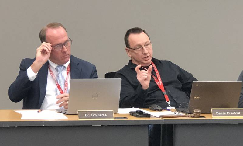 Yorkville School District 115 Interim Superintendent Tim Kilrea (left) and Board President Darren Crawford (right) at a Jan. 29 public hearing at the district's Administration Center at 800 Game Farm Road.