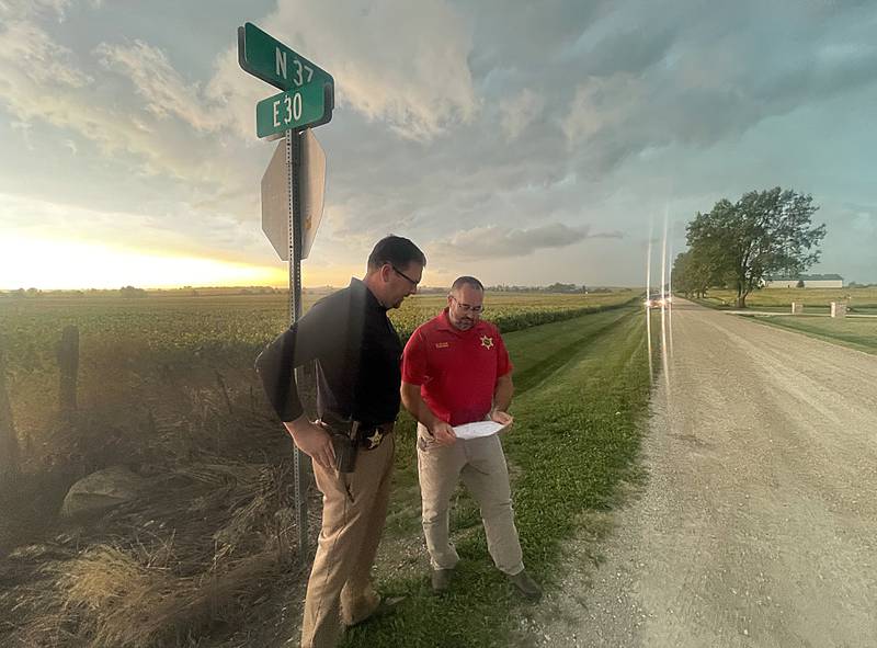 La Salle County Sheriff Adam Diss, and La Salle County coroner Richard Ploch, look at a map showing the exact site where Jane Doe was found near the intersection of North 37th Road and East 30th  in La Salle County on Tues Sep. 7, 2021. "Jane Doe" was an unidentified white female found in Mission Township, near Norway on September 13, 1991. Jane Doe is buried in a donated grave at Oakwood Memorial Park in Ottawa. She is the only case of an unidentified body in La Salle County.