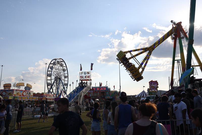 The sun begins to set at the Taste of Joliet on Friday, June 21, 2024 at Joliet Memorial Stadium.