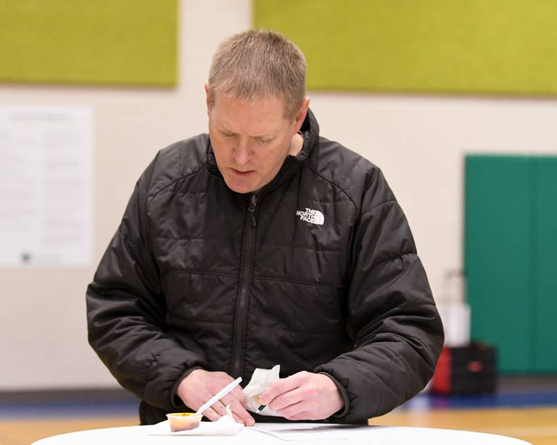 Ken Goodman, of Sycamore, ranks chili he taste tested during the Sycamore Park District's Fire and Ice Festival held at the Sycamore Park District Community Center on Saturday, Jan. 13, 2024.