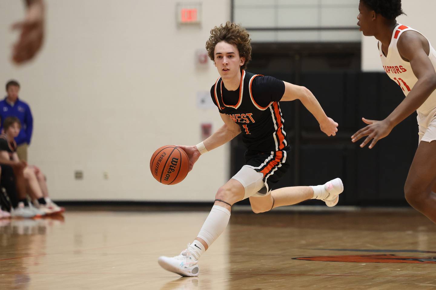 Lincoln-Way West’s Jacob Bereza works the ball midcourt against Rich Township in the Class 4A Lincoln-Way West Regional semifinal on Wednesday, Feb. 21st 2024 in New Lenox.