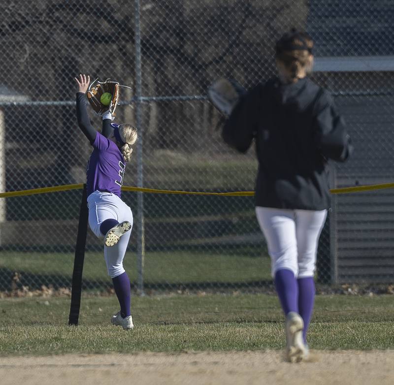 Dixon’s Delaney Bruce goes deep in left field to haul in a fly ball against Sterling Tuesday, March 19, 2024 in Dixon.