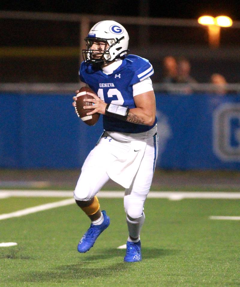 Geneva quarterback Tony Chahino looks to throw the ball during a game against Lemont Friday, Sept. 6, 2024 at Geneva.