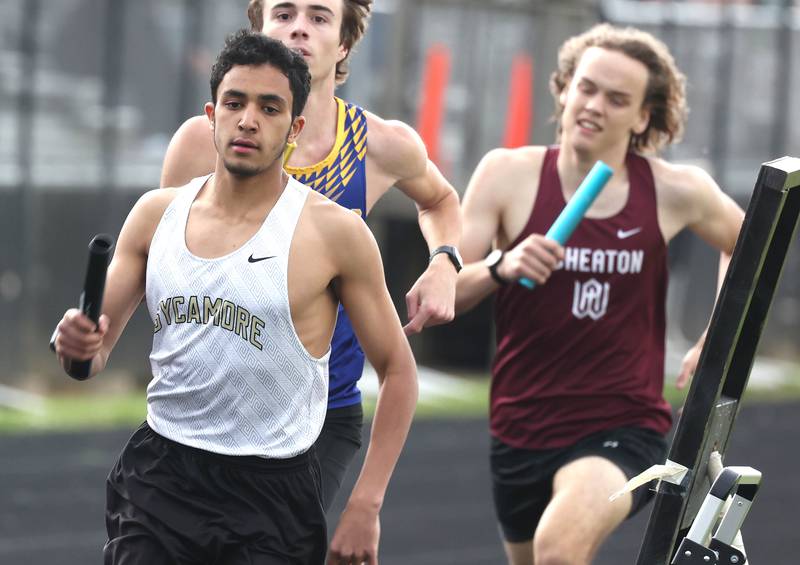 Sycamore’s Naif Al Harby runs his leg of the 4x800 meter relay Thursday, May 16, 2024, during the Class 2A boys track sectional at Sycamore High School.