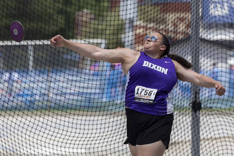 Dixon’s Olivia Cox fires the discus in the 2A event Saturday, May 18, 2024 at the IHSA girls state track meet in Charleston.