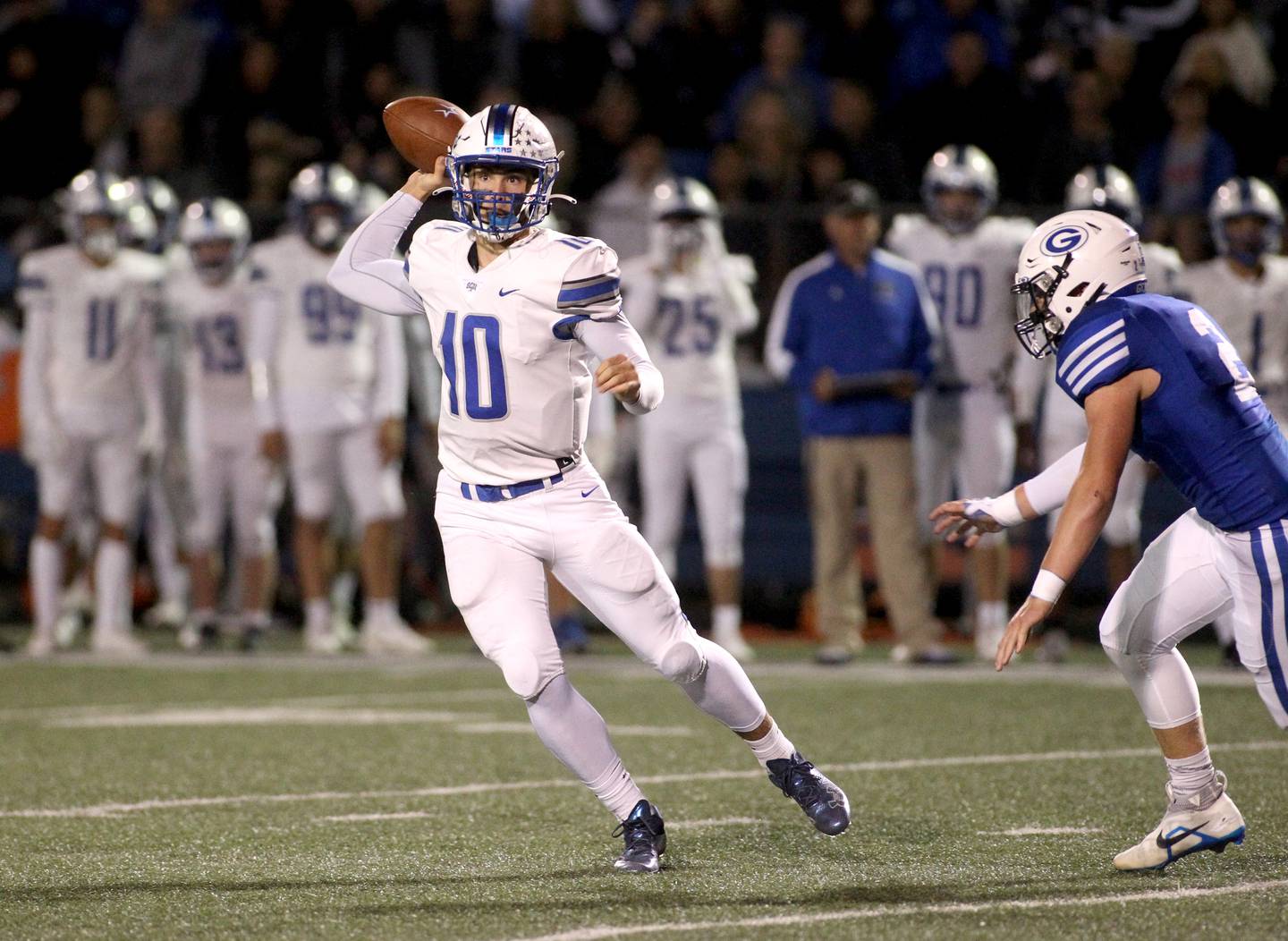 St. Charles North’s Ethan Plumb throws the ball during a game at Geneva on Friday, Sept. 23, 2022.