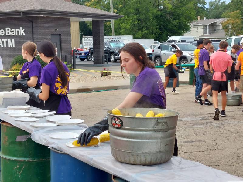 Sweet corn is prepared to be distributed Sunday, Aug. 13, 2023, at the Mendota Sweet Corn Festival.